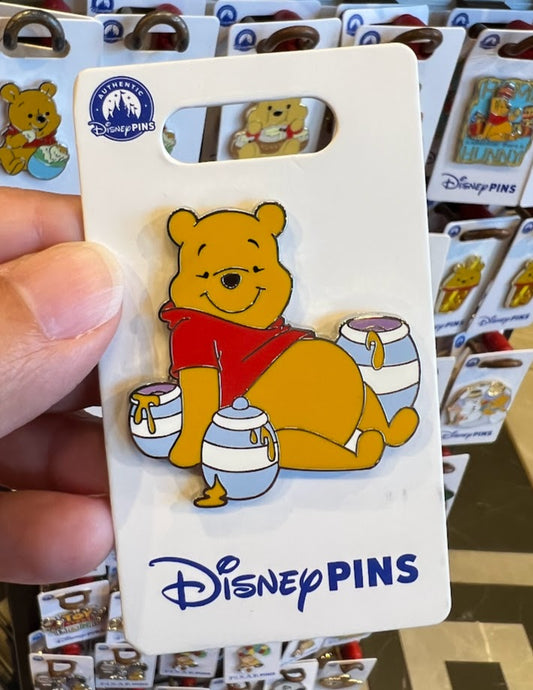 Winnie the Pooh with Hunny Jars Disney Pin